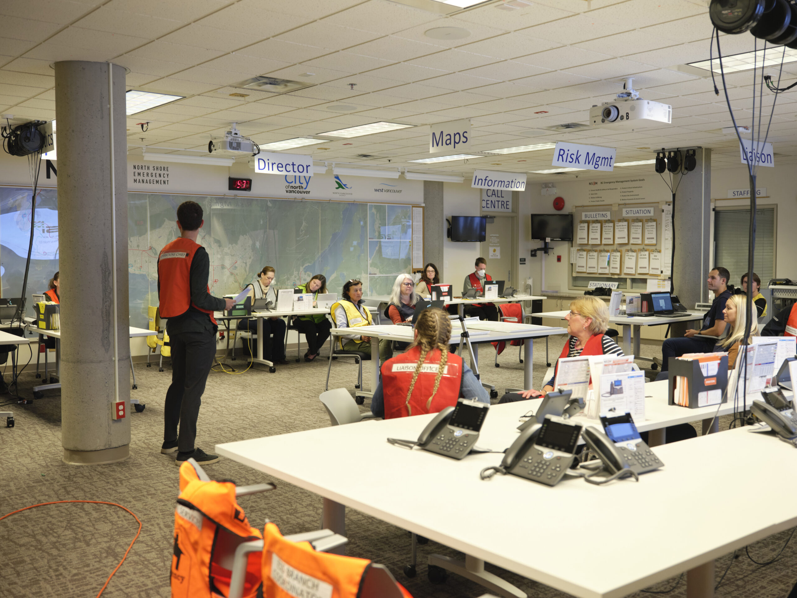 Staff and volunteers from North Shore Emergency Management and partner agencies across the North Shore are gathered in the Emergency Operations Centre.