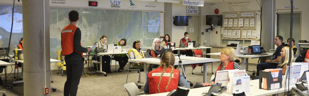 Staff and volunteers from North Shore Emergency Management and partner agencies across the North Shore are gathered in the Emergency Operations Centre.